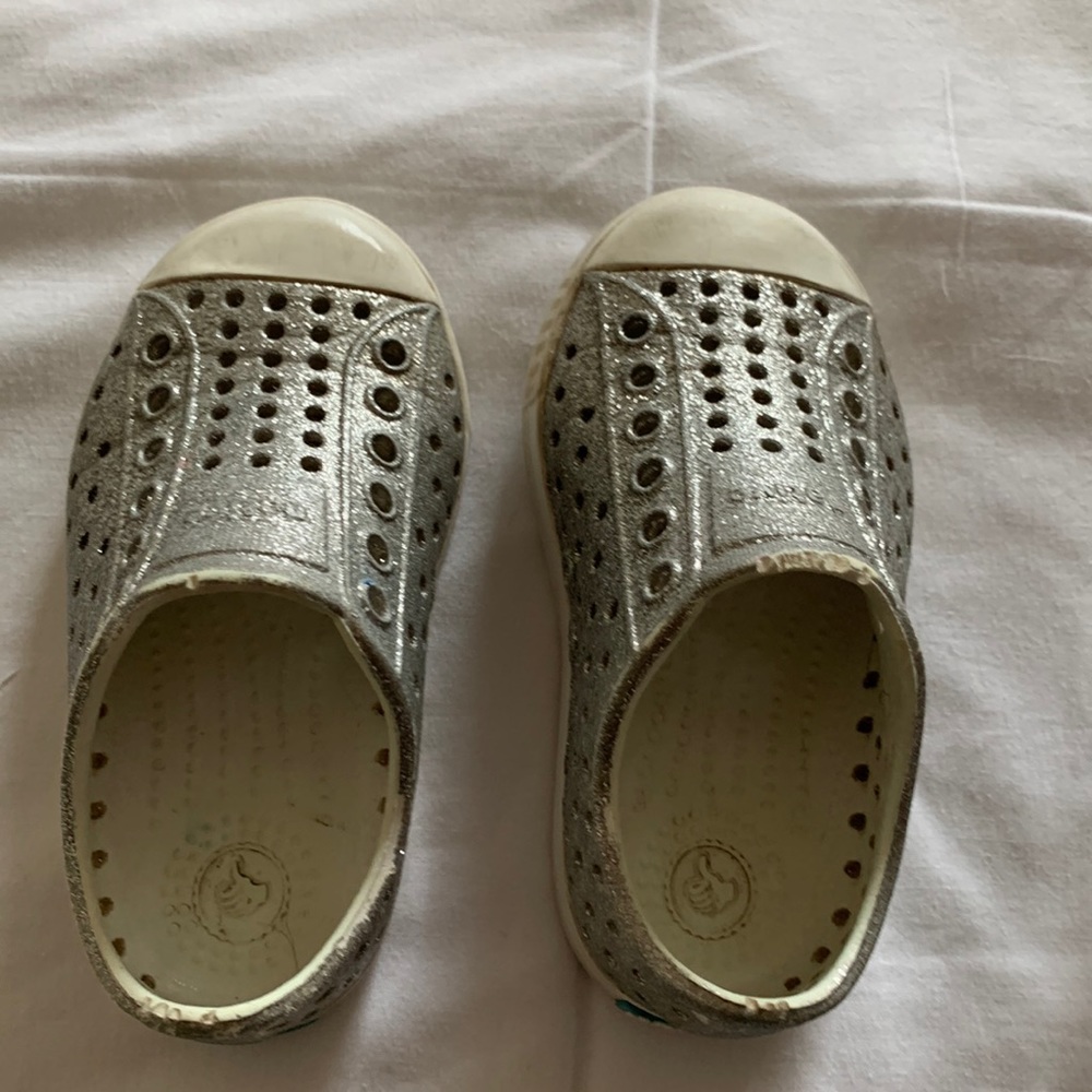 Silver sparkle Native shoes, size C6